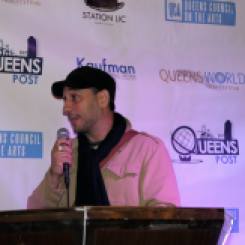 Fred Zara accepting an award for Timothy Neil Williams for Best Actor at the Queens World Film Festival